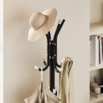 simple metal coat rack with marble base and 12 staggered hooks, 70" tall